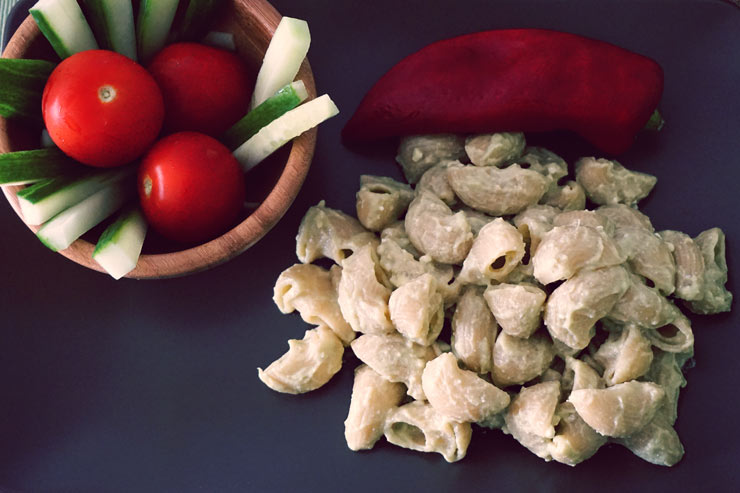 Pasta with vegetables and cherry tomatoes.